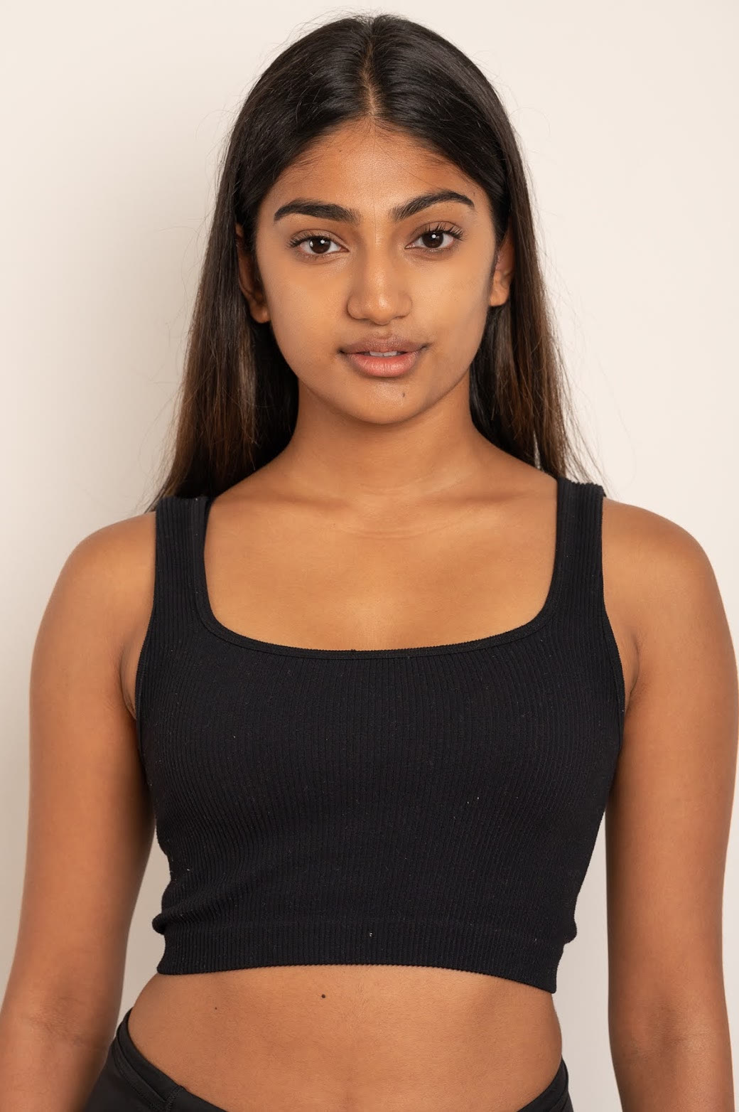 Mahika Valluri, studio commercial portrait in a black ribbed tank